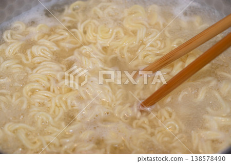 Cooking instant ramen Cooking instant ramen 138578490