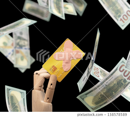 Mounting credit card debt, band-aid on card is deeper finance problem. Flying dollar bills represent uncontrolled spending. Band-aid solution can't fix stress of potential bankruptcy Mounting credit card debt, band-aid on card is deeper finance problem. Flying dollar bills represent uncontrolled spending. Band-aid solution can't fix stress of potential bankruptcy 138578589