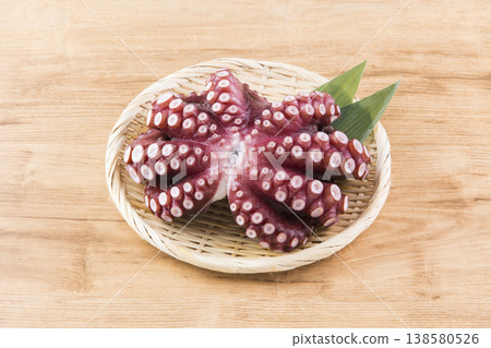 Octopus served in a bamboo basket 138580526
