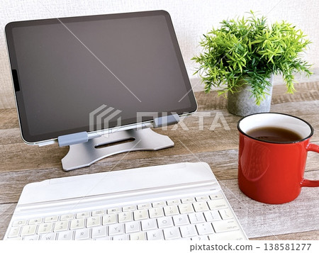 Digital devices, small desks, tablet computers Digital devices, small desks, tablet computers 138581277