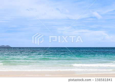A beach under a clear blue sky A beach under a clear blue sky 138581841