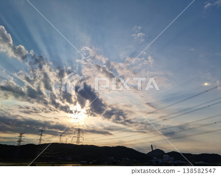 Dark mountain silhouette and sunset sky. 138582547