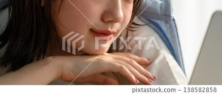 A woman stares at her laptop: Happy Pop A woman stares at her laptop: Happy Pop 138582858