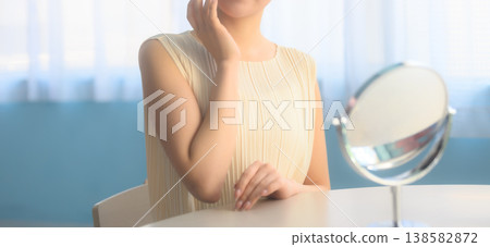Woman doing skincare in front of a mirror: Happy Pop Woman doing skincare in front of a mirror: Happy Pop 138582872