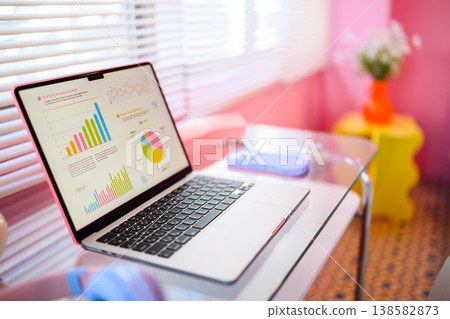 Laptop displaying business analysis screen: Happy Pop Laptop displaying business analysis screen: Happy Pop 138582873