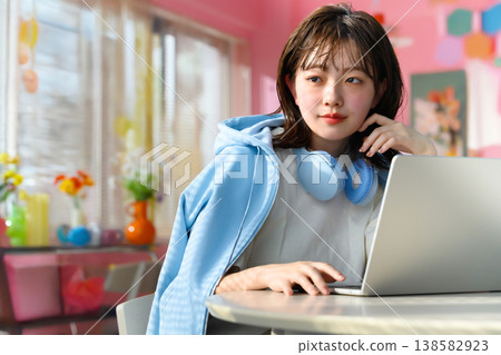 Woman working on a laptop: Happy Pop Woman working on a laptop: Happy Pop 138582923