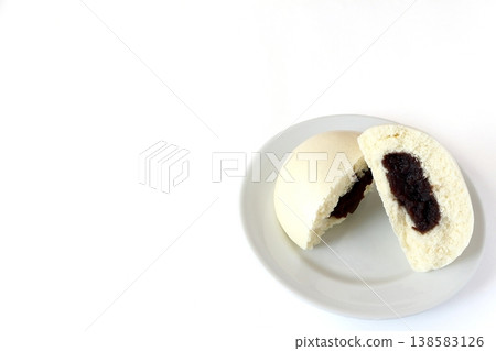 Sesame bean paste bun with a white background Sesame bean paste bun with a white background 138583126