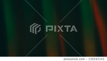 Reflection defocused glow. Lucent flare. Color striped light on dark black background. Vibrant abstract green red night luminosity. Reflection defocused glow. Lucent flare. Color striped light on dark black background. Vibrant abstract green red night luminosity. 138583141