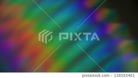 Iridescent lens. Defocused holographic flare. Colorful kaleidoscopic beam crystal glass reflection. Fluorescent rainbow abstract background. 138583401