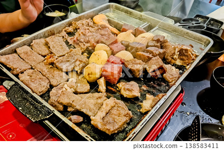 close up view of grilling goat and beef close up view of grilling goat and beef 138583411