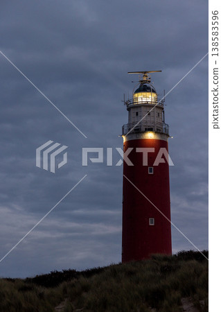 Eierland, De Cocksdorp, Texel, The Netherlands, Oktober 28th, 2024, A stunning Red Lighthouse stands 138583596