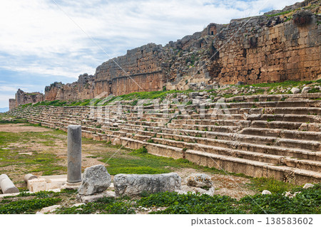 Stadium of ancient Greek city Tlos in Lycia located on Lycian way. Famous historical site In Antalya region. Popular place for family travel on summer vacation. Fethiye, Turkey Stadium of ancient Greek city Tlos in Lycia located on Lycian way. Famous historical site In Antalya region. Popular place for family travel on summer vacation. Fethiye, Turkey 138583602