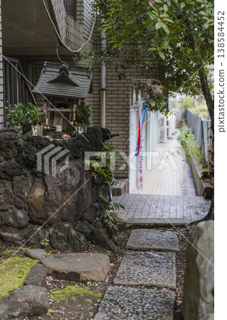 A small shrine nestled in an alleyway in Oji Otonashi Waterfront Park A small shrine nestled in an alleyway in Oji Otonashi Waterfront Park 138584452