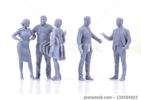 Miniature people interact in a social setting with detailed figurines showcasing various poses Miniature people interact in a social setting with detailed figurines showcasing various poses 138584883