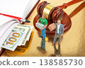Miniature people in a court setting with money and gavel present in the scene 138585730