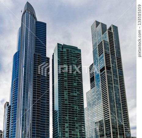 Glass skyscraper. City architecture. Architecture of modern office building. Perspective city skyscraper. Business skyscraper building. Architectural building in business area. Modern city 138585859