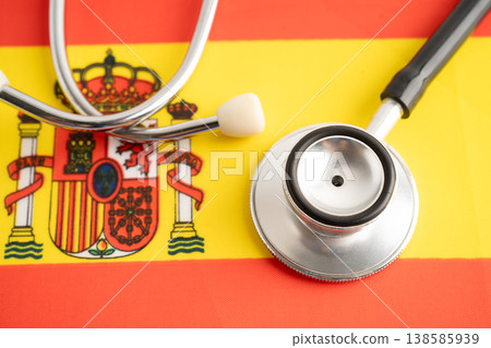 Stethoscope on Spain flag, business and finance. Stethoscope on Spain flag, business and finance. 138585939