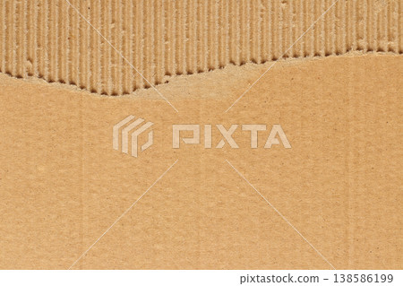 Brown cardboard sheet abstract background, texture of recycle paper box in old vintage pattern with ripped edges. Brown cardboard sheet abstract background, texture of recycle paper box in old vintage pattern with ripped edges. 138586199