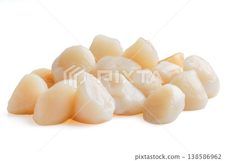 Scallops are displayed in a pile ready for cooking and serving to enjoy fresh seafood meals 138586962