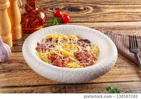 Italian classic spaghetti carbonara with bacon and egg Italian classic spaghetti carbonara with bacon and egg 138587293