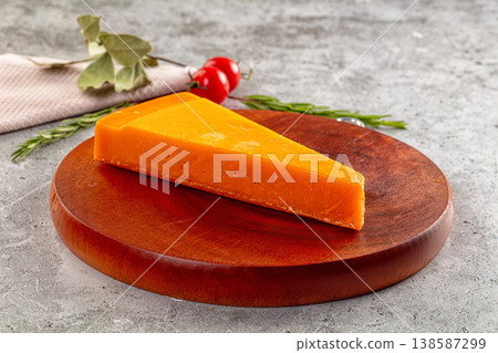 Yellow cheddar cheese over board Yellow cheddar cheese over board 138587299