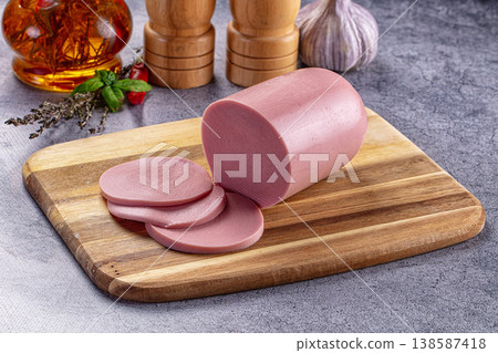 Boiled pork pink sausages with slices Boiled pork pink sausages with slices 138587418