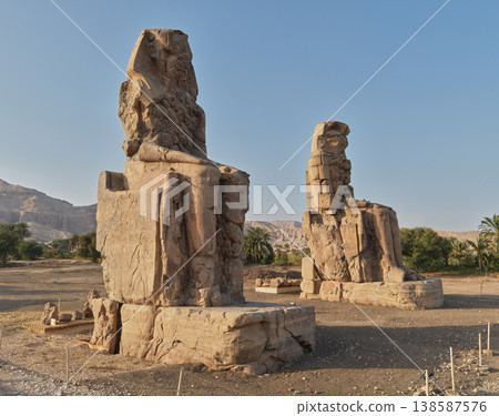 Two Colossi of Memnon—Ancient Egyptian Ruins on the West Bank of Luxor Two Colossi of Memnon—Ancient Egyptian Ruins on the West Bank of Luxor 138587576