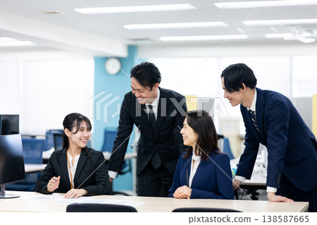 Business people chatting and laughing 138587665