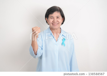 Elderly with blue Ribbon for Prostate Cancer Awareness month, April Child Abuse Prevention, National Bullying, September Addiction Recovery, May Chronic Fatigue Syndrome and January Human Trafficking Elderly with blue Ribbon for Prostate Cancer Awareness month, April Child Abuse Prevention, National Bullying, September Addiction Recovery, May Chronic Fatigue Syndrome and January Human Trafficking 138588567