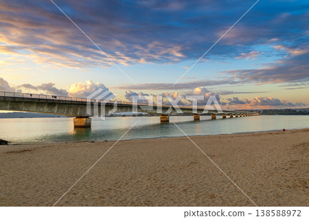 Okinawa: View of Kouri Bridge from Kouri Beach at dawn. 138588972