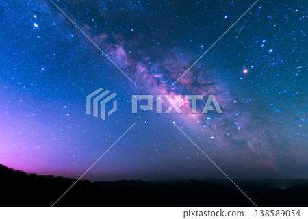 The vibrant Milky Way stretches across the Hatenashi Mountains. 138589054