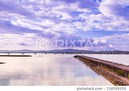 Okinawa: View of Kouri Bridge from Kouri Port in the early morning. Okinawa: View of Kouri Bridge from Kouri Port in the early morning. 138589350