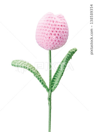 Pink, hand-crocheted tulips cut out against a white background. Pink, hand-crocheted tulips cut out against a white background. 138589354