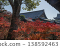 A temple surrounded by autumn leaves 138592463