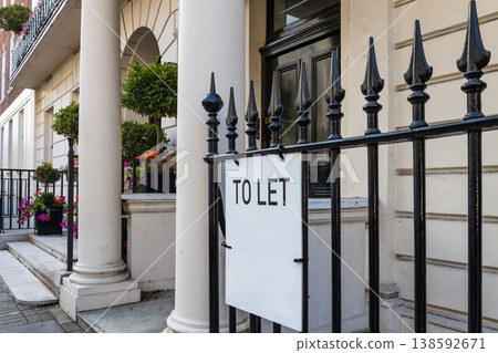 To let sign on a metal fence outside a luxury residential property To let sign on a metal fence outside a luxury residential property 138592671