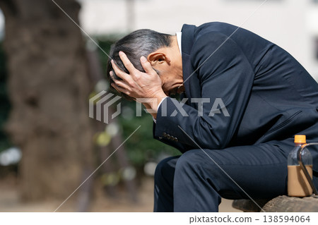 depressed businessman 138594064