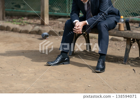 A depressed businessman's hands 138594071