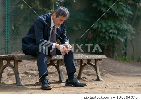 depressed businessman depressed businessman 138594073