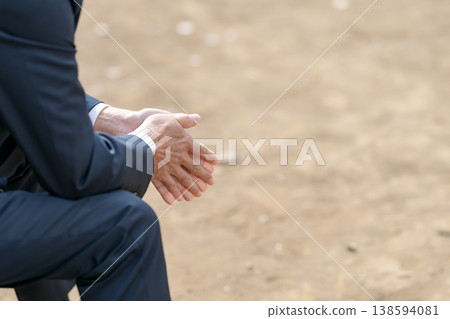 A depressed businessman's hands 138594081