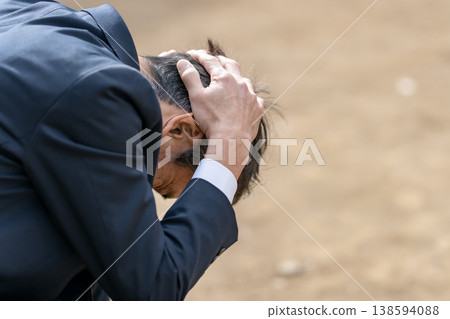 depressed businessman 138594088