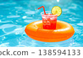 Refreshing Summer Drink Floating in Pool 138594133