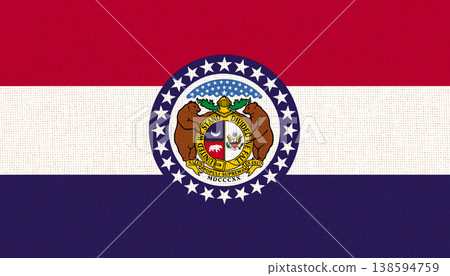 Flag of American state Missouri on fabric surface. Missouri state flag Flag of American state Missouri on fabric surface. Missouri state flag 138594759