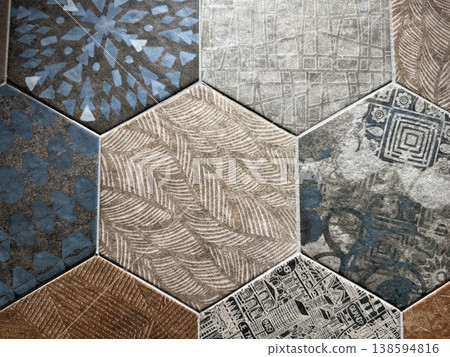 Hexagonal tiles with various textures and patterns create an intricate geometric background 138594816