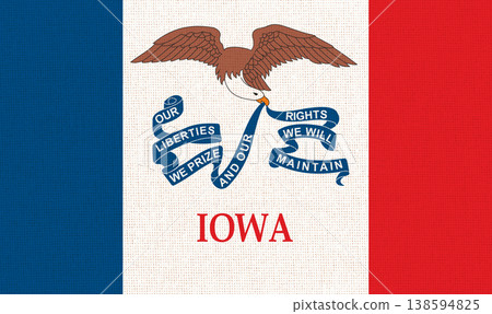 Flag of American state Iowa on fabric surface. Iowa state flag 138594825