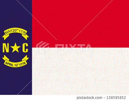 Flag of American state North Carolina on fabric surface. North Carolina flag Flag of American state North Carolina on fabric surface. North Carolina flag 138595852