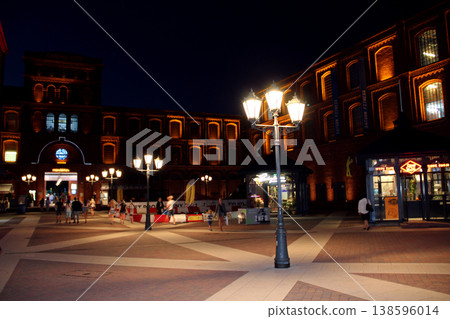 Touristic street of Polish city Lodz in night. Bright lantern. Night street Touristic street of Polish city Lodz in night. Bright lantern. Night street 138596014