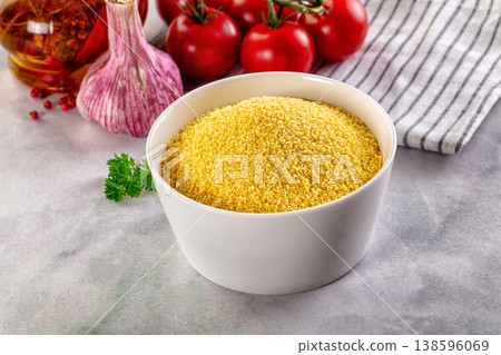 Vegan cuisine - raw dry couscous Vegan cuisine - raw dry couscous 138596069