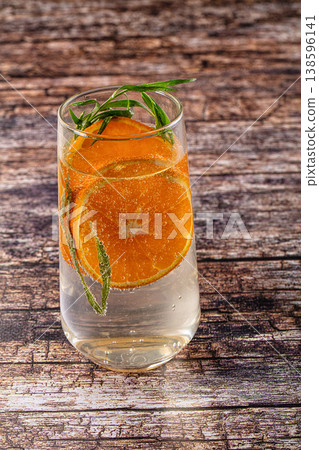 Orange cold lemonade with tarragon Orange cold lemonade with tarragon 138596141