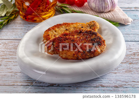 Breaded meat fillet escalope schnitzel Breaded meat fillet escalope schnitzel 138596178