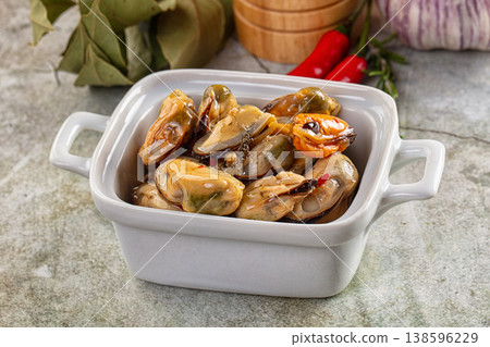 Canned mussels in oil and spices 138596229